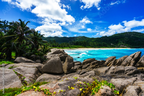 rocks at wild tropical beach with palms,white sand and turquoise water, seychelles 1