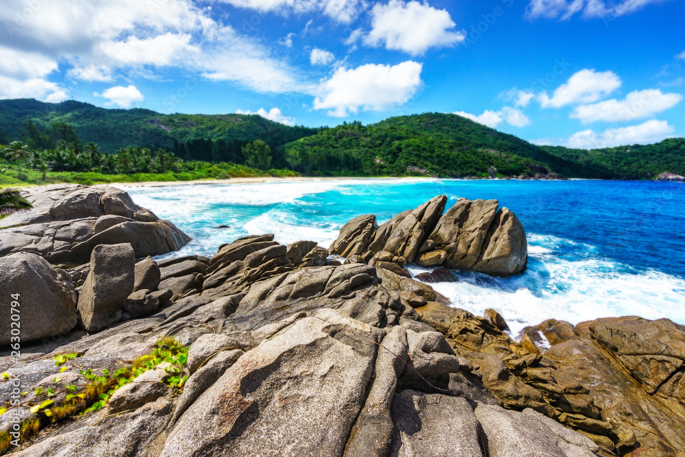rocks at wild tropical beach with palms,white sand and turquoise water, seychelles 3