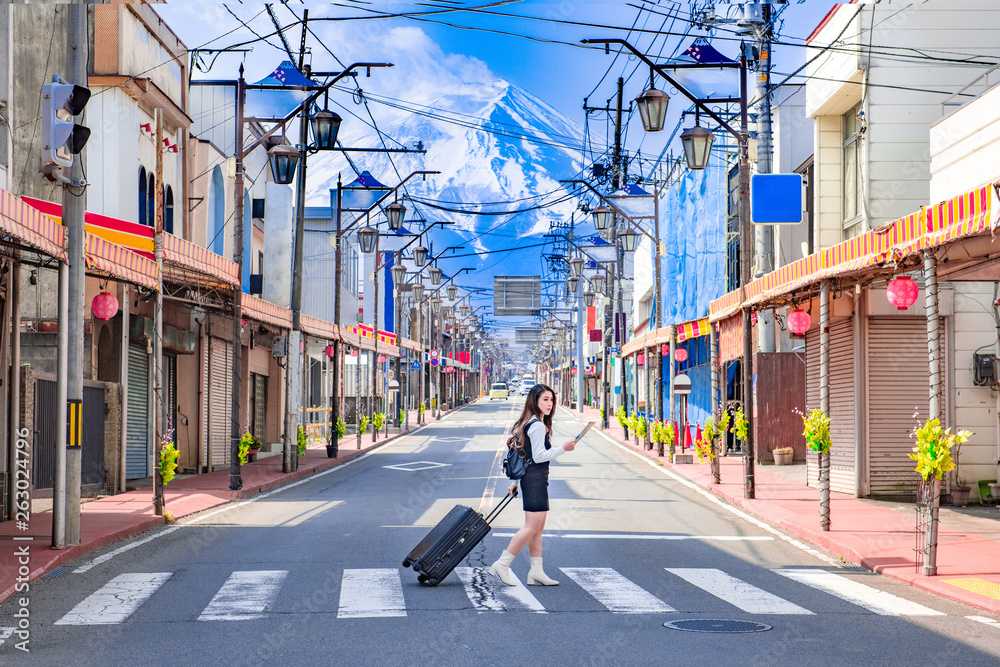 Women tourists cross the street of Yamanashi,Japan.