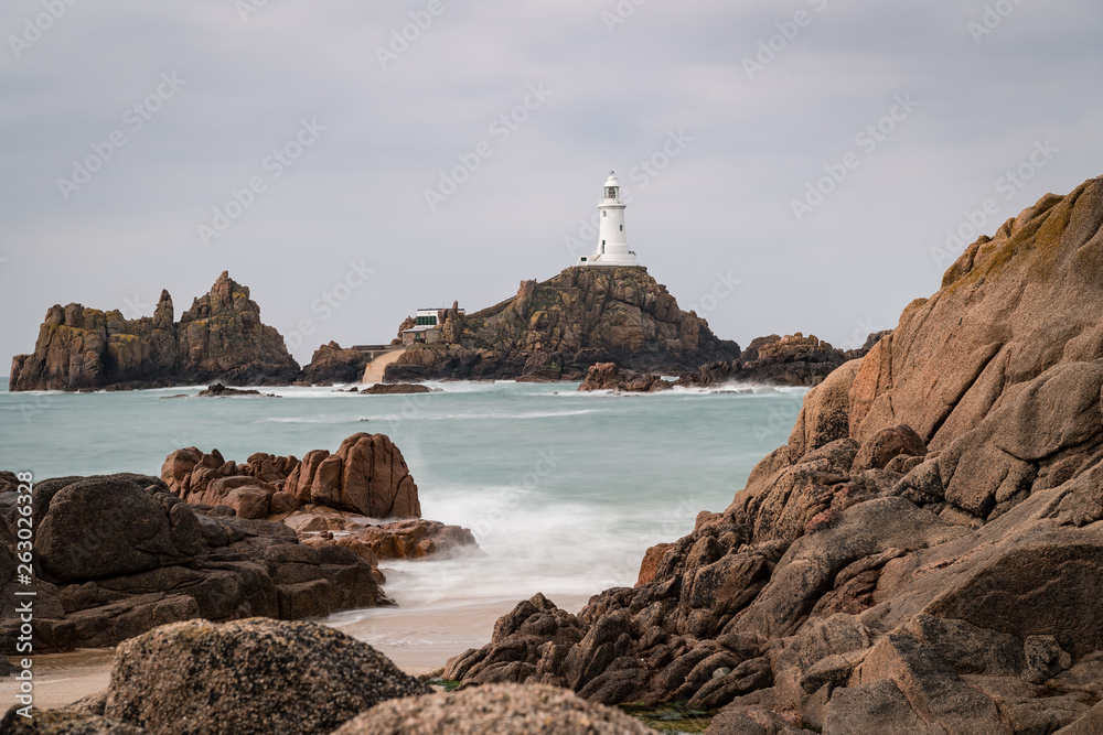 La Corbiere Lighthouse at high tide, Jersey, Channel Islands La Corbiere Lighthouse at high tide, Jersey, Channel Islands