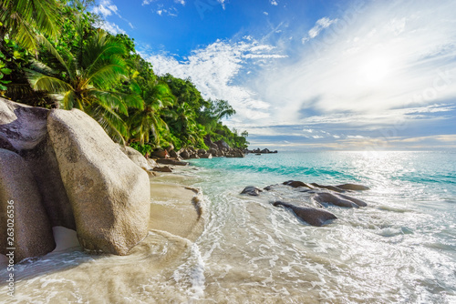 Paradise tropical beach with rocks,palm trees and turquoise water in sunshine, seychelles 6