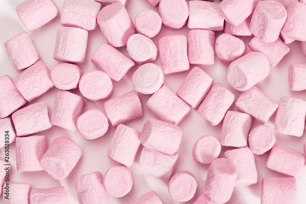 Marshmallow pattern. Gentle pink mini zephyr pastel colored. Vanilla tenderness. Sweet food background. Top view. Marshmallow pattern. Gentle pink mini zephyr pastel colored. Vanilla tenderness. Sweet food background. Top view.