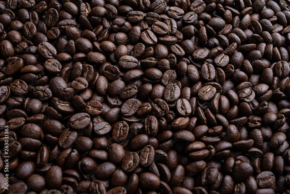 Fototapeta premium Coffee beans on black background