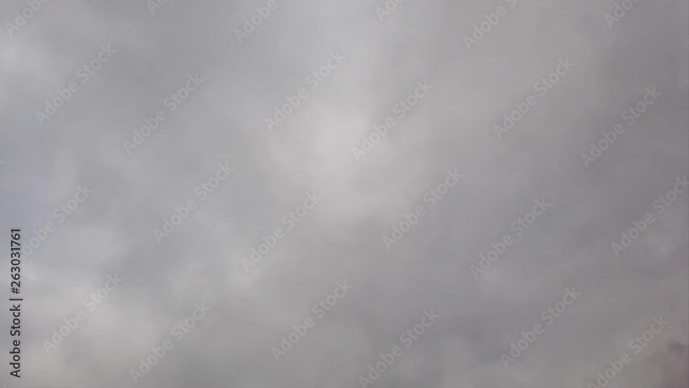 Timelapse sky with dense gray nimbostratus clouds blow like smoke Timelapse sky with dense gray nimbostratus clouds blow like smoke