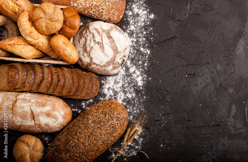 Assortment of baked goods on dark background