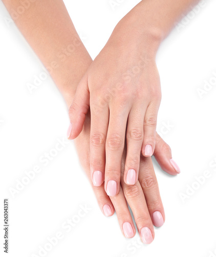 Woman with beautiful hands on white background  closeup. Spa treatment