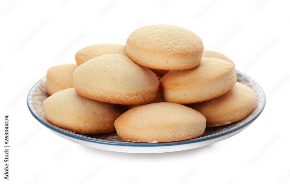 Plate with cookies for Islamic holidays isolated on white. Eid Mubarak Plate with cookies for Islamic holidays isolated on white. Eid Mubarak