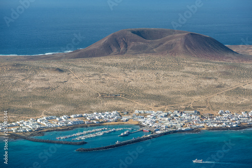 Il porto de La Graciosa, isola senza strade asfaltate di fronte a Lanzarote, arcipelago delle Canarie photo