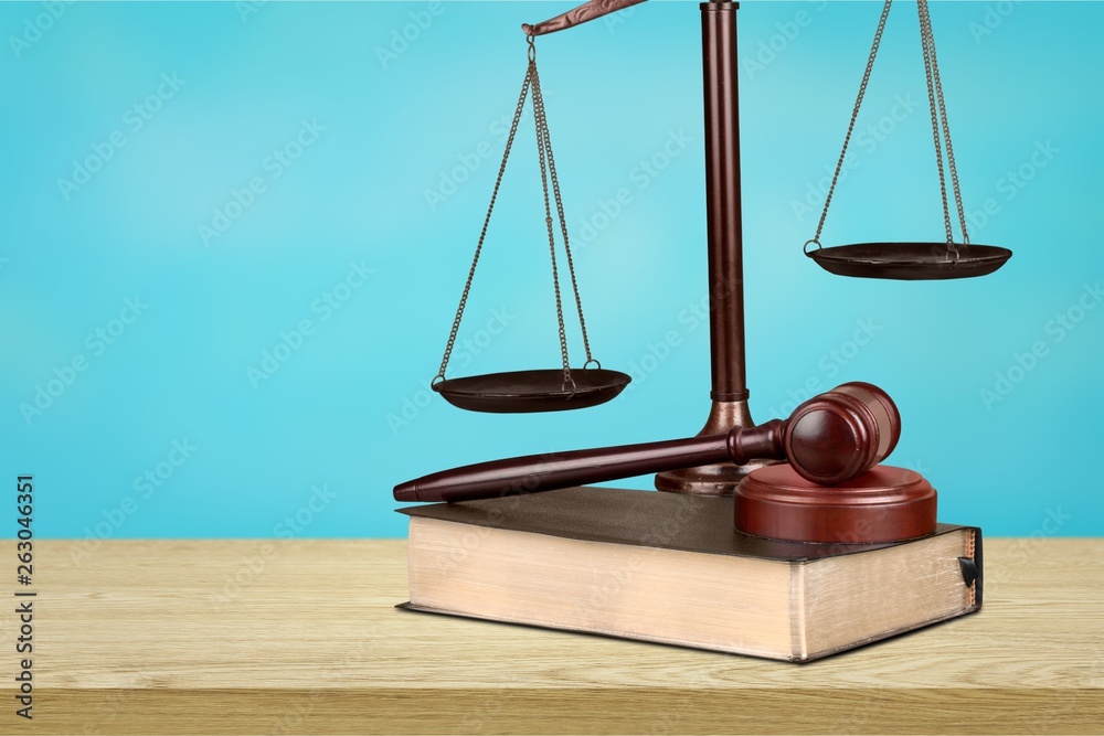 Justice Scales and books and wooden gavel on table. Justice concept Justice Scales and books and wooden gavel on table. Justice concept