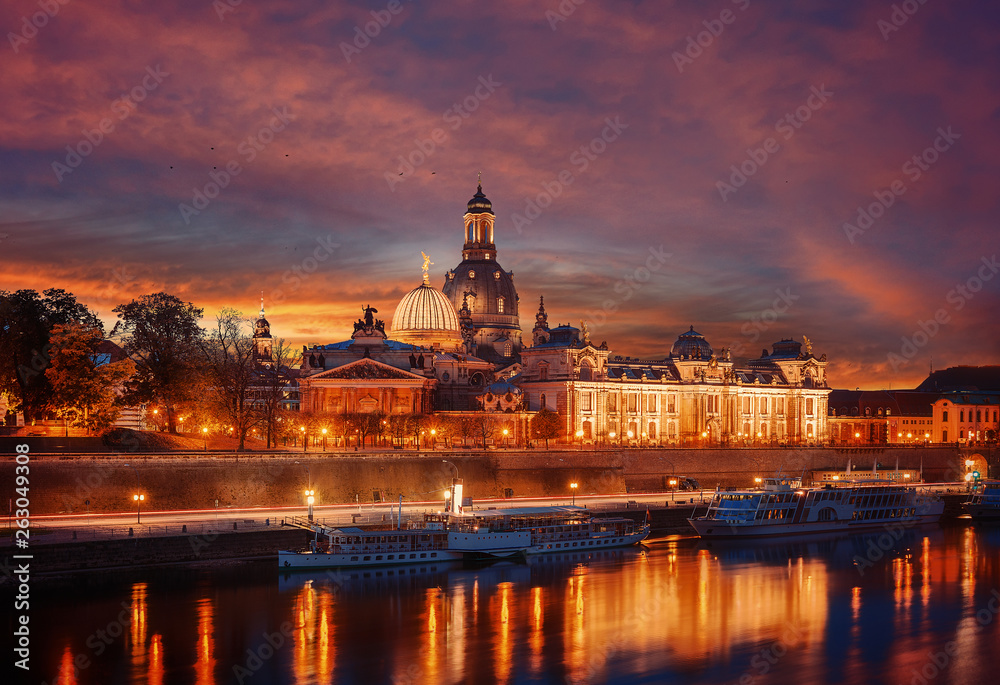 Amazing colorful scene during sunset  at the Old Town in Dresden, Saxony, Germany. Famouse Sights: Frauenkirche, Hofkirche, Semperoper with reflected in water. wonderful picturesque scenery. Postcard