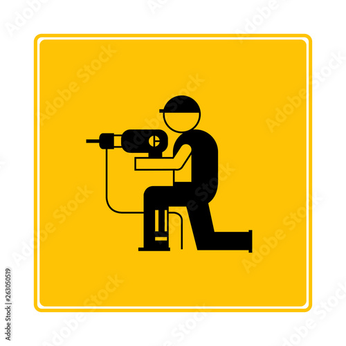 worker using driller icon in yellow background