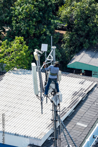 Technicians Working On A Telecommunication Tower © kowitstockphoto
