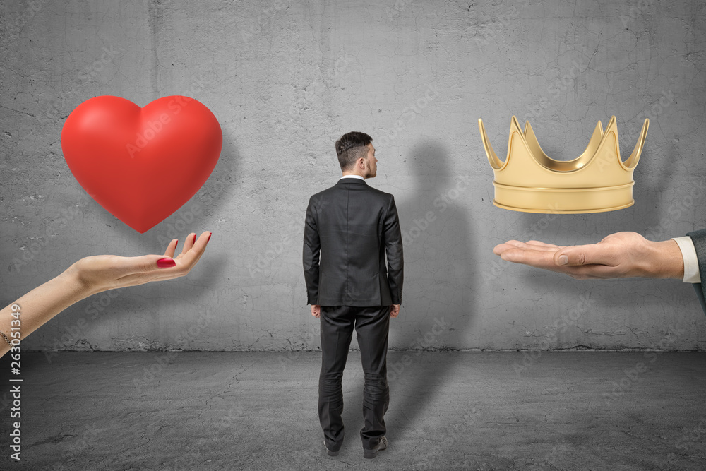 Two hands holding a hotsell heart with a crown