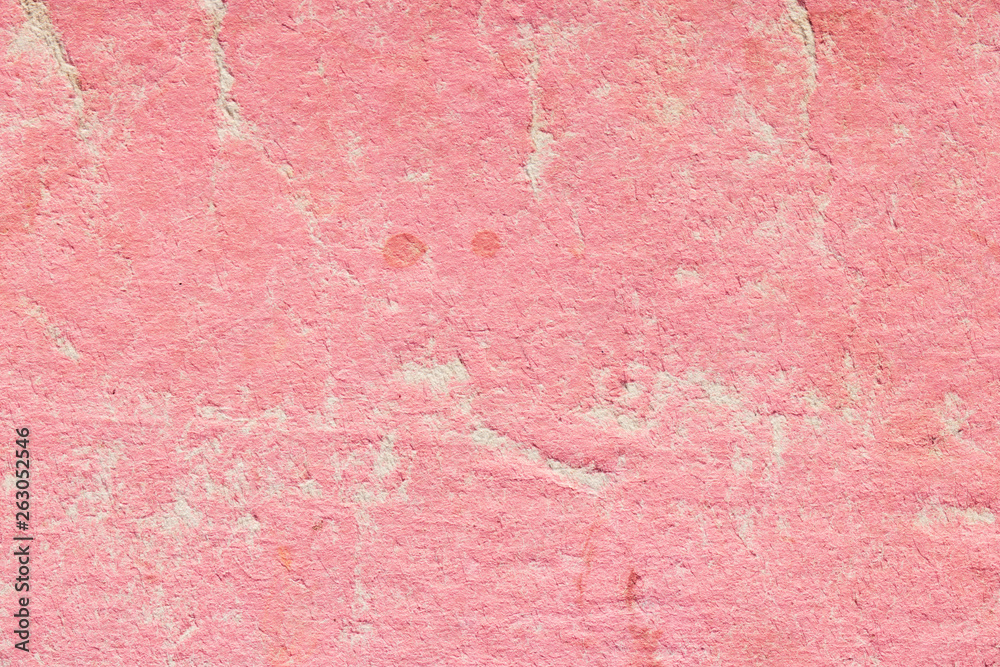 Texture of pink old cardboard with scuffs. Empty and shabby background. Texture of pink old cardboard with scuffs. Empty and shabby background.