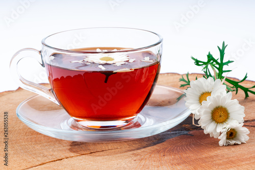 cup of tea with chamomile flowers