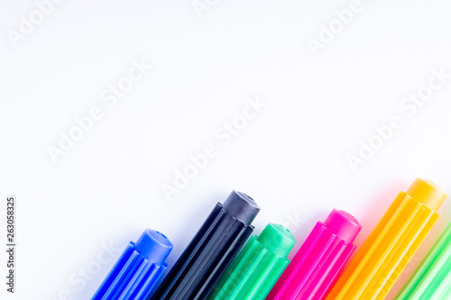 Closeup color pencils isolated on white background with selective focus and crop fragment. Back to school and Education Concept.