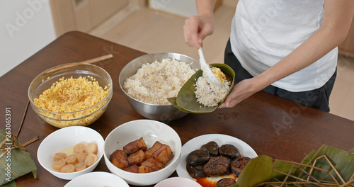 Photography Woman make of rice dumpling at home