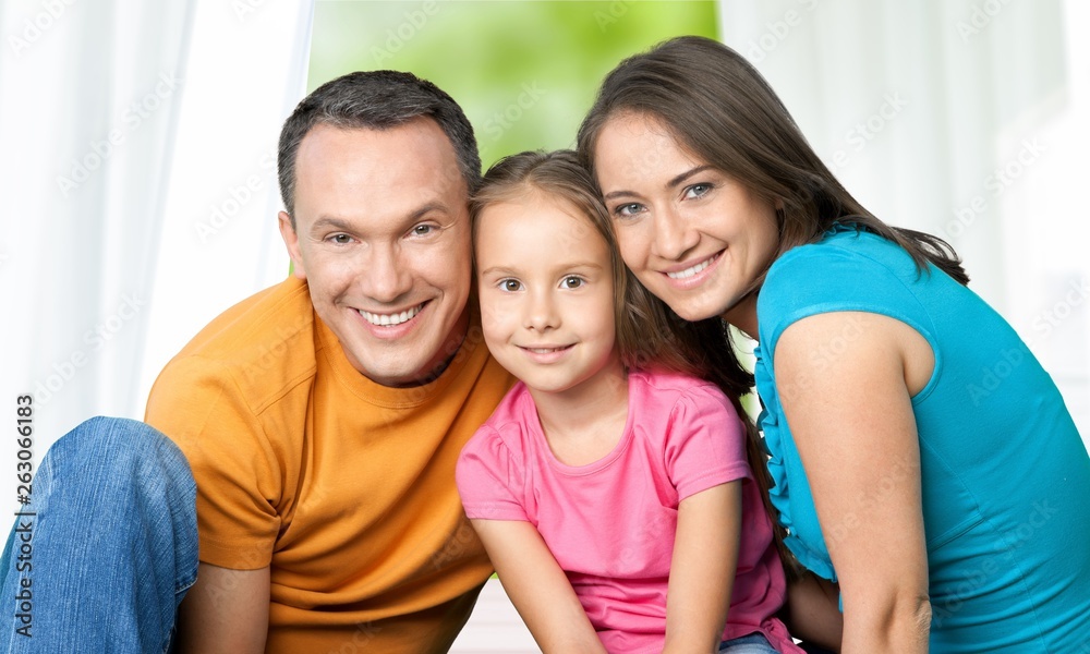 Beautiful smiling family on background