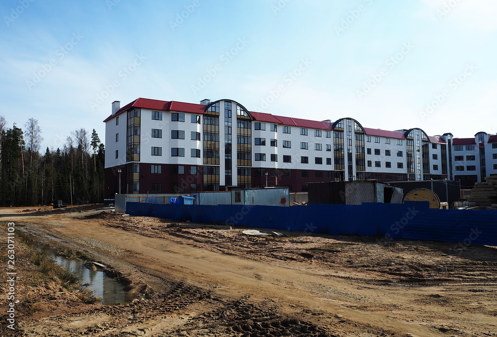 Construction of an apartment building. Construction of modern housing for different people. Details and close-up.