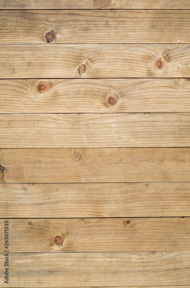 Fototapeta premium New varnished wooden wall closeup