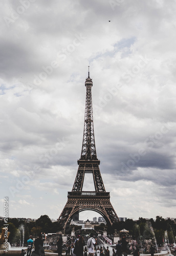 Eiffel Tower view in Paris, France with cloud sky © Dominik Pacholczyk