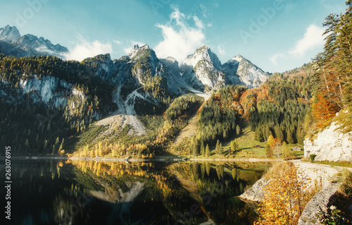 Sunny morning, at Vorderer Gosausee lake. picturesque autumn scenery. Lake under Warm sun. view of Austrian Alps, Austria, Europe. Beauty in the world. concept of travel. Retro Style. Insraram Effect © jenyateua