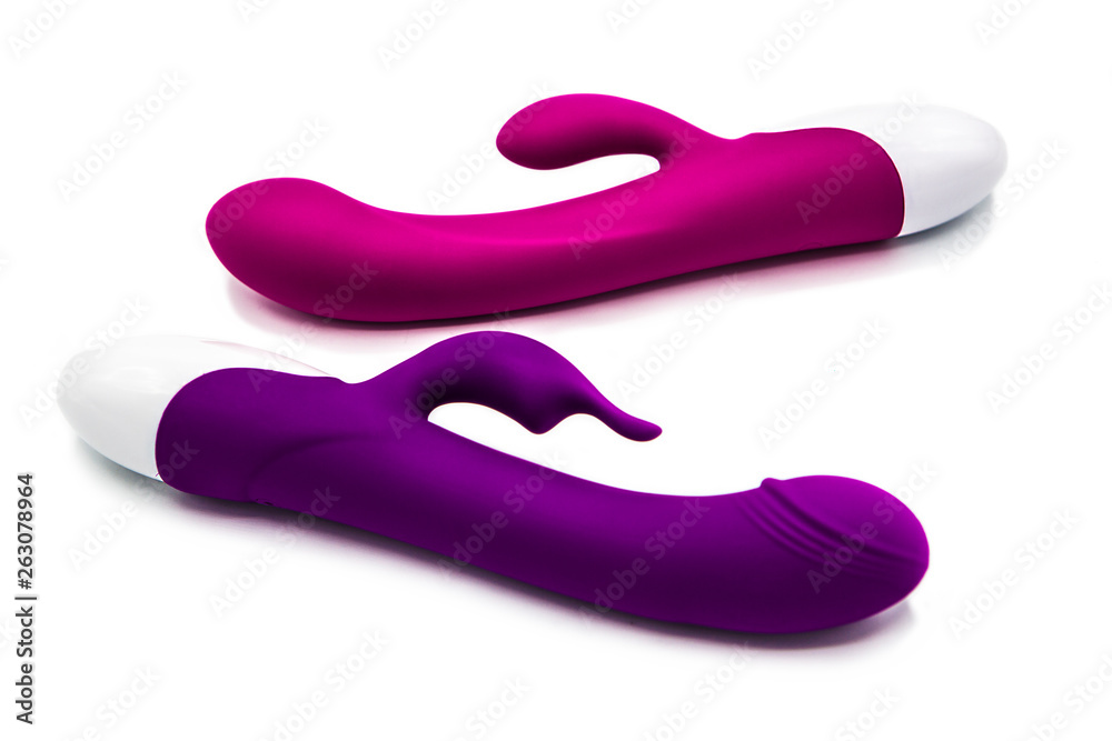 Sex toys. Vibrators purple and pink isolated on white background Sex toys. Vibrators purple and pink isolated on white background
