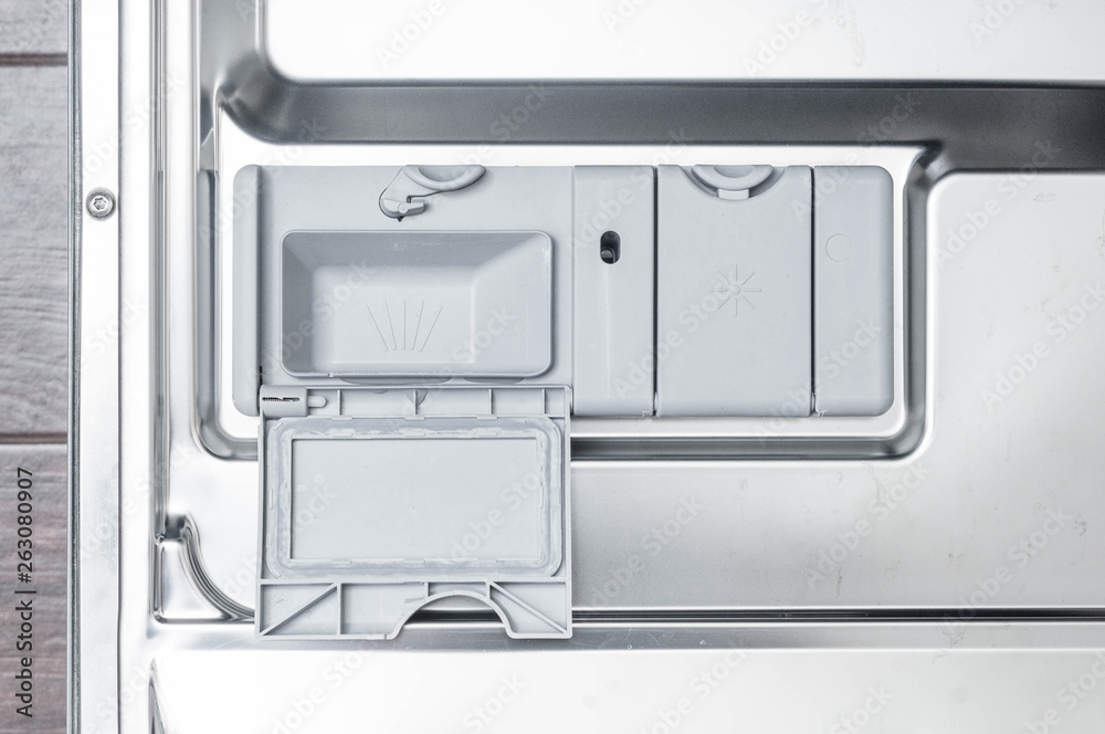 Obraz premium Dishwasher as the efficient use of resources for domestic and everyday activities.