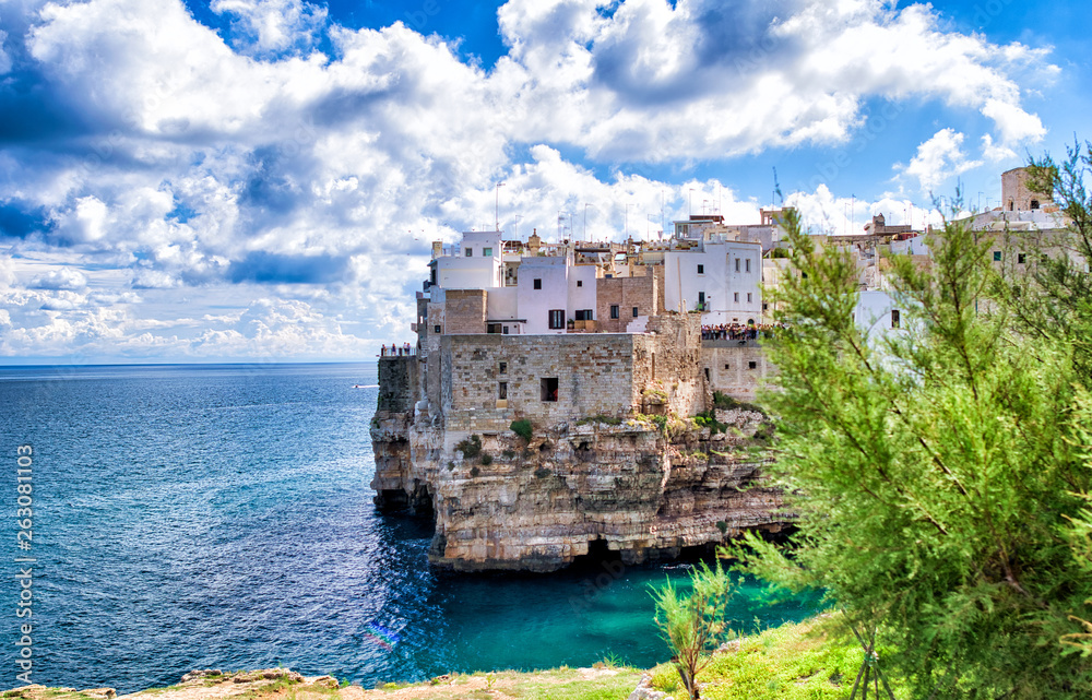 Polignano a Mare - Apulia, Italy. Beautiful aerial view of cityscape and coastline on a beautiful summer day
