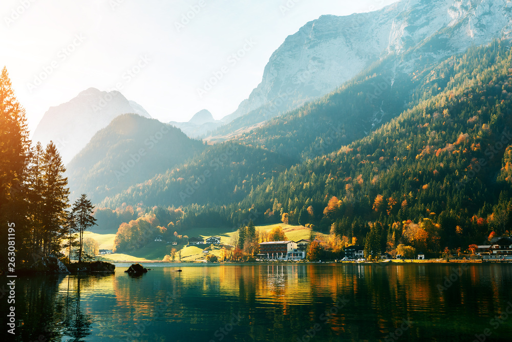 Fototapeta premium Alps, lake Hintersee in the morning, Majestic German Alps mountains under sunlight on a sunny day. Scenic view of the silent lake Hintersee in Ramsau, Germany. Popular location for photographers.