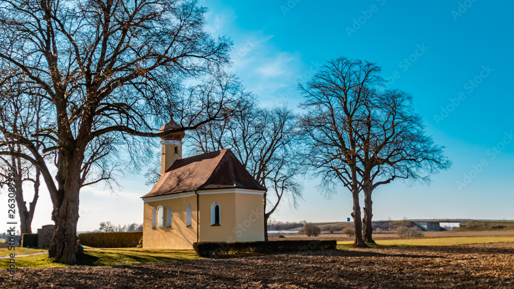 Fototapeta premium Beautiful winter view at a chapel near Wallersdorf-Bavaria-Germany