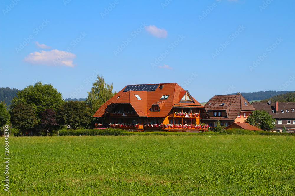 Typical Blackforest style house in South Germany Typical Blackforest style house in South Germany
