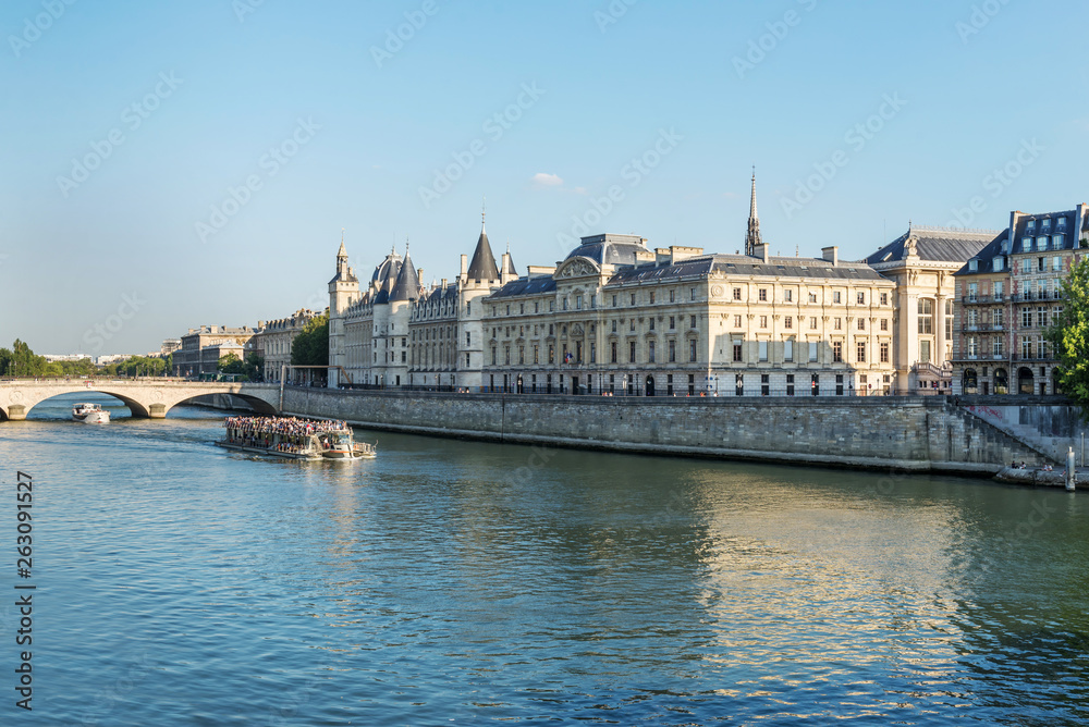 Pleasure boat with people sailing on the river Seine. Paris. France. 