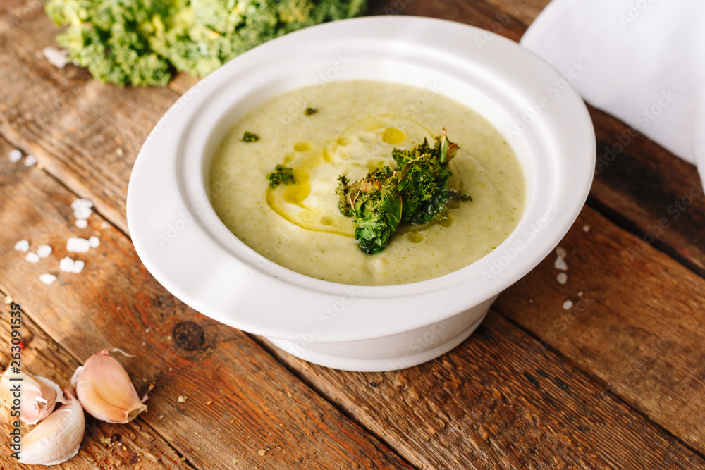 Cauliflower cream soup. Oil and cabbage. Wooden. Kitchen. Homemade. Dieting. Healthy food. Cauliflower cream soup. Oil and cabbage. Wooden. Kitchen. Homemade. Dieting. Healthy food.