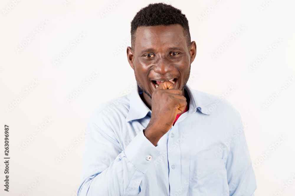Young bearded man surprised emotional standing with open mouth.