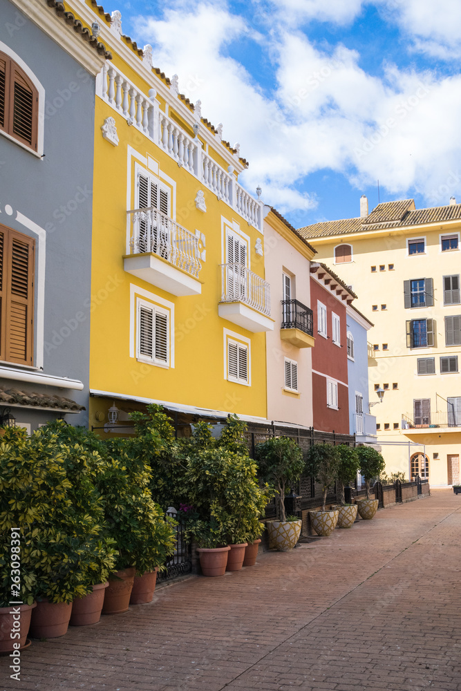 Fototapeta premium facades of houses of different colors in Port saplaya, Valencia