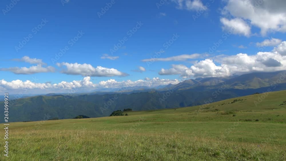 View mountains scenes in national park Dombai, Caucasus, Russia, Europe. Summer landscape, sunshine weather, blue sky and sunny day View mountains scenes in national park Dombai, Caucasus, Russia, Europe. Summer landscape, sunshine weather, blue sky and sunny day