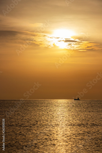 Golden summer Adriatic Sea sunrise with a ship at Senigallia, Province of Ancona, Marche, Italy © Stanislava