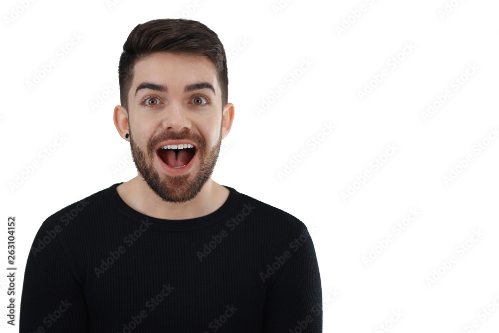 extremely happy man with open mouth smiling - young man receiving an excellent news - whit space for caption or text - white background extremely happy man with open mouth smiling - young man receiving an excellent news - whit space for caption or text - white background