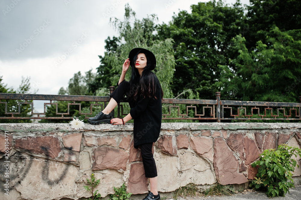 Sensual girl all in black, red lips and hat. Goth dramatic woman. Sensual girl all in black, red lips and hat. Goth dramatic woman.