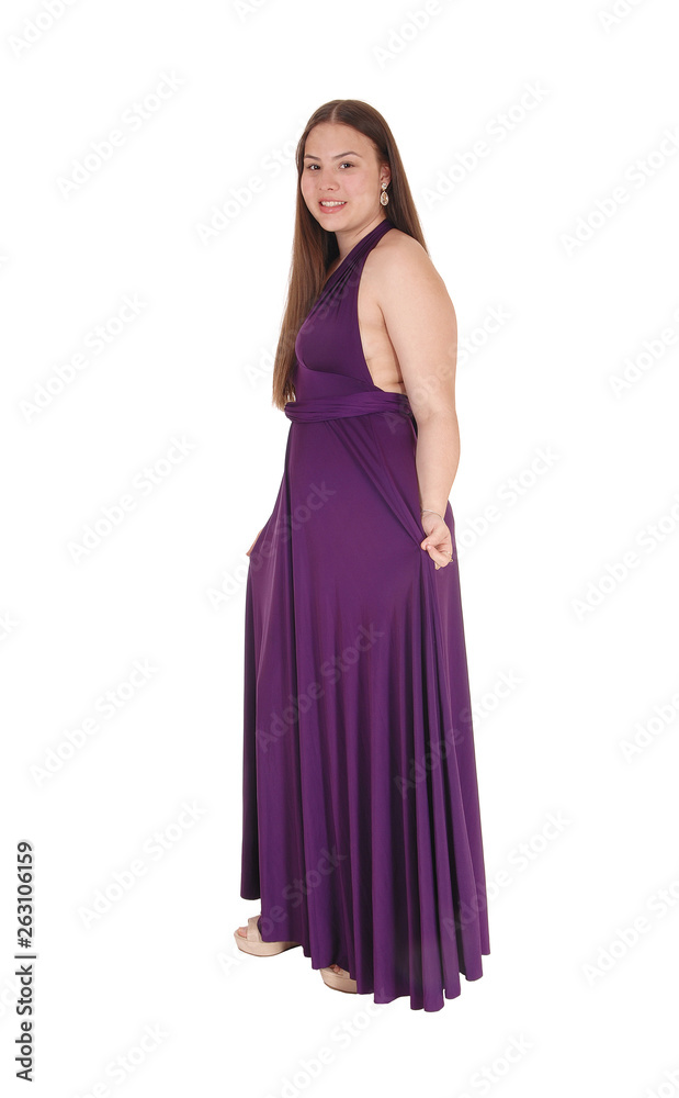 Teenager girl standing in her prom dress Teenager girl standing in her prom dress