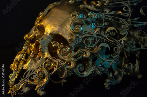 Gold, golden skull made with 3d printer and pieces by hand. Gothic piece of decoration for halloween or horror scenes © Fernando Cortés