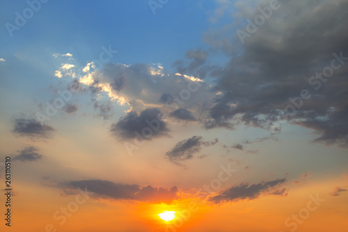 Fototapeta Naklejka Na Ścianę i Meble -  sunset over the dramatic cloudy sky