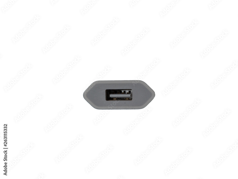 USB connection on a white charger plug isolated USB connection on a white charger plug isolated
