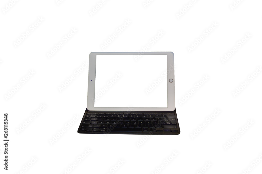 Tablet on a keyboard isolated on white background for composite or edits Tablet on a keyboard isolated on white background for composite or edits