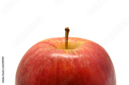 Ripe red Apple with handle macro photo of an object isolated on a white background.