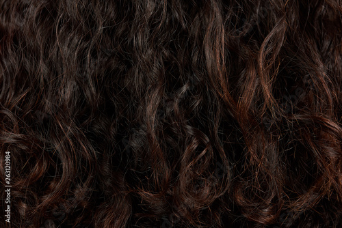 Dark curly hair closeup