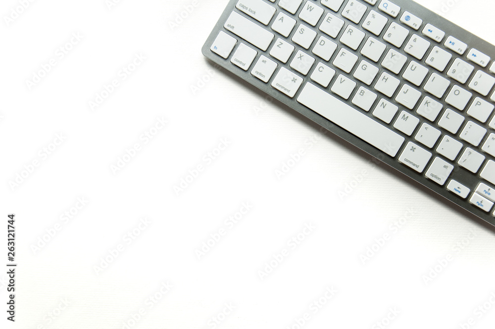 Keyboard on a white background. Typing office work. School and learning background for site. Keyboard on a white background. Typing office work. School and learning background for site.