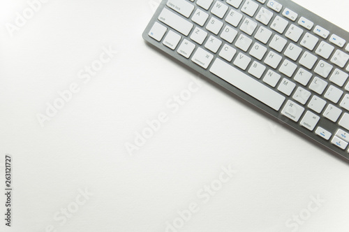 Keyboard on a white background. Typing office work. School and learning background for site.
