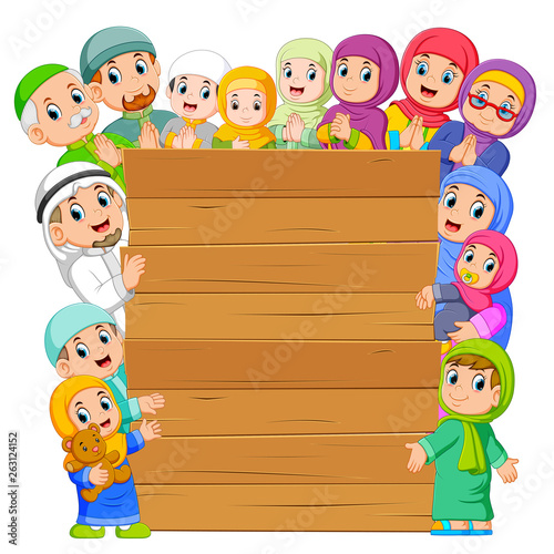 the board with the muslim family around it 